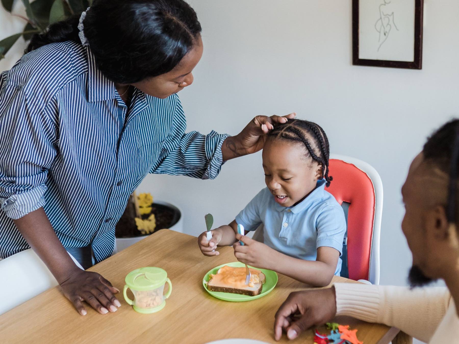 A family eating together at a kitchen table